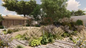 Jardin contemporain luxuriant avec allée de gravier, chalet en bois, et massifs de fleurs hautes et herbes ornementales sous un ciel bleu.